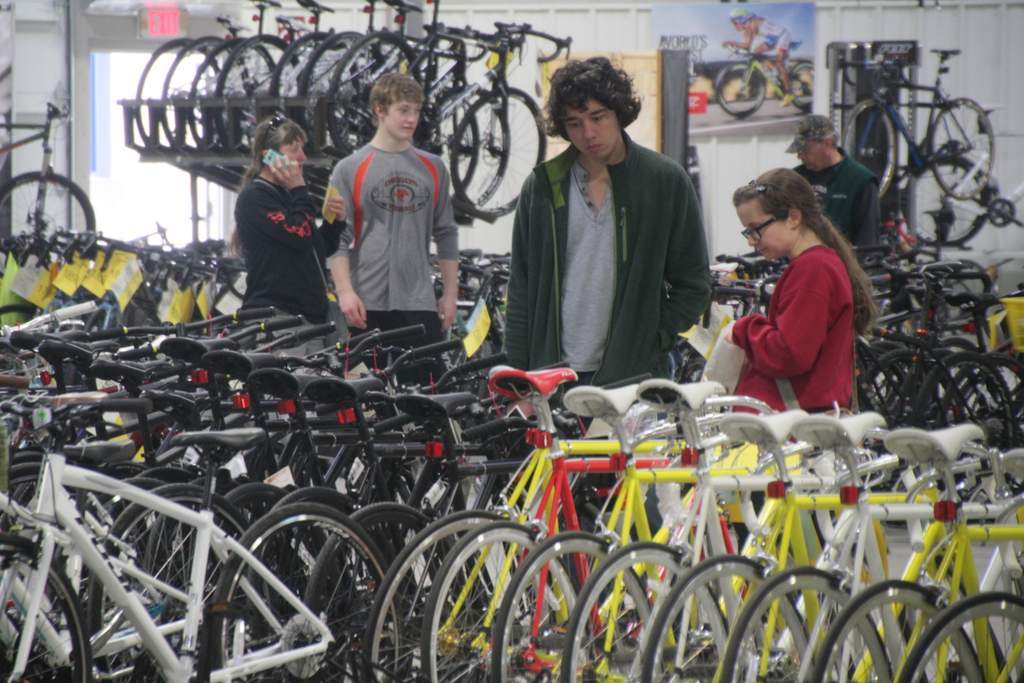Customers checking out the fixed gear bicycles.